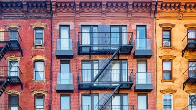 top-stories-of-colorful-williamsburg-apartment-buildings-with-steel-picture-id877226544.webp_.jpg